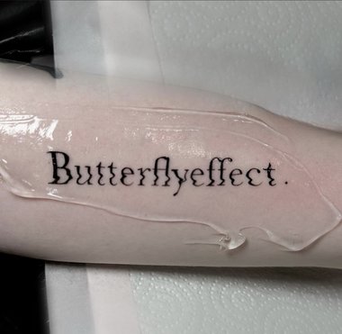 Butterflyeffect Schriftzug Tattoo